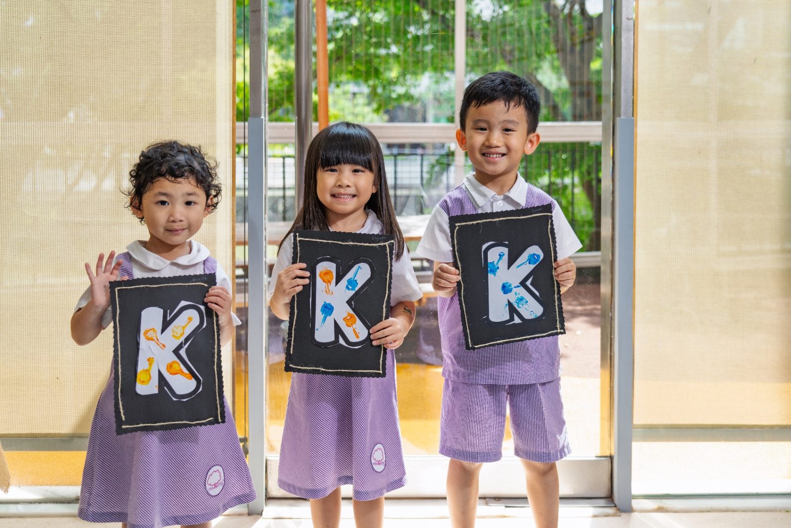 Mulberry kindergarten children with their artwork